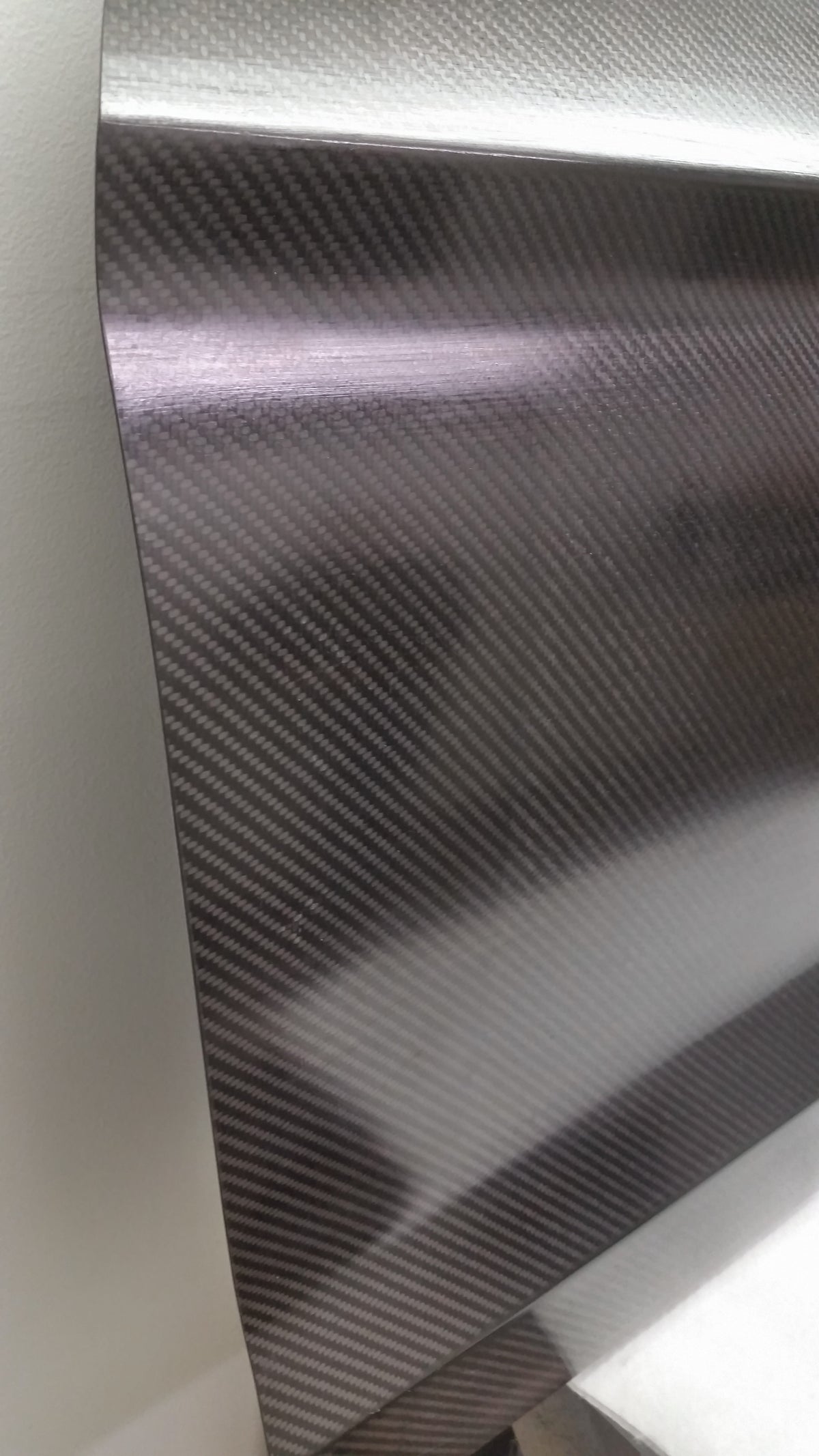 Autoclave-prepreg carbon fiber Mustang S550 door skin from Paul's Automotive Engineering, showing sleek textured surface and precise fit