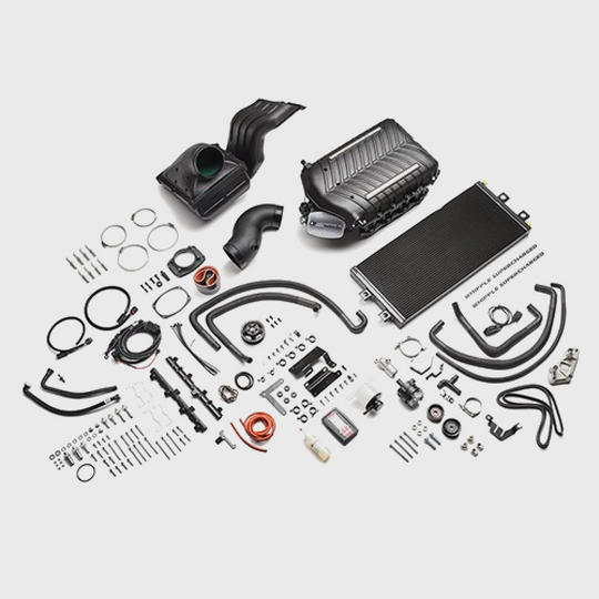 Ford Performance supercharger kit for 2021-2026 F-150 5.0L V8 engine, includes supercharger components and installation hardware.