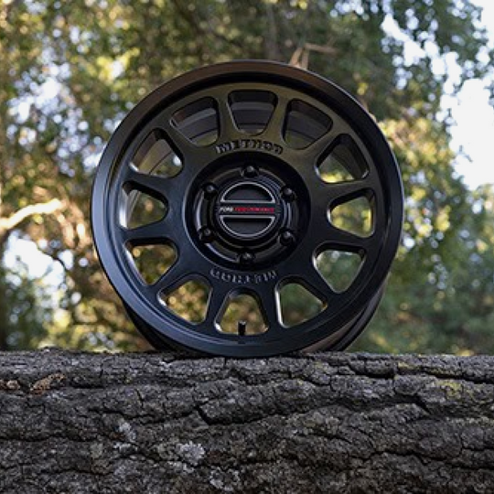 Set of five Ford Performance Bronco 17-inch black Method wheels with center caps, designed for off-road and street use.