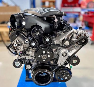 Whipple Superchargers Godzilla 7.3L Ford SC supercharger system installed on a Ford engine, showcasing the high-performance boost components.