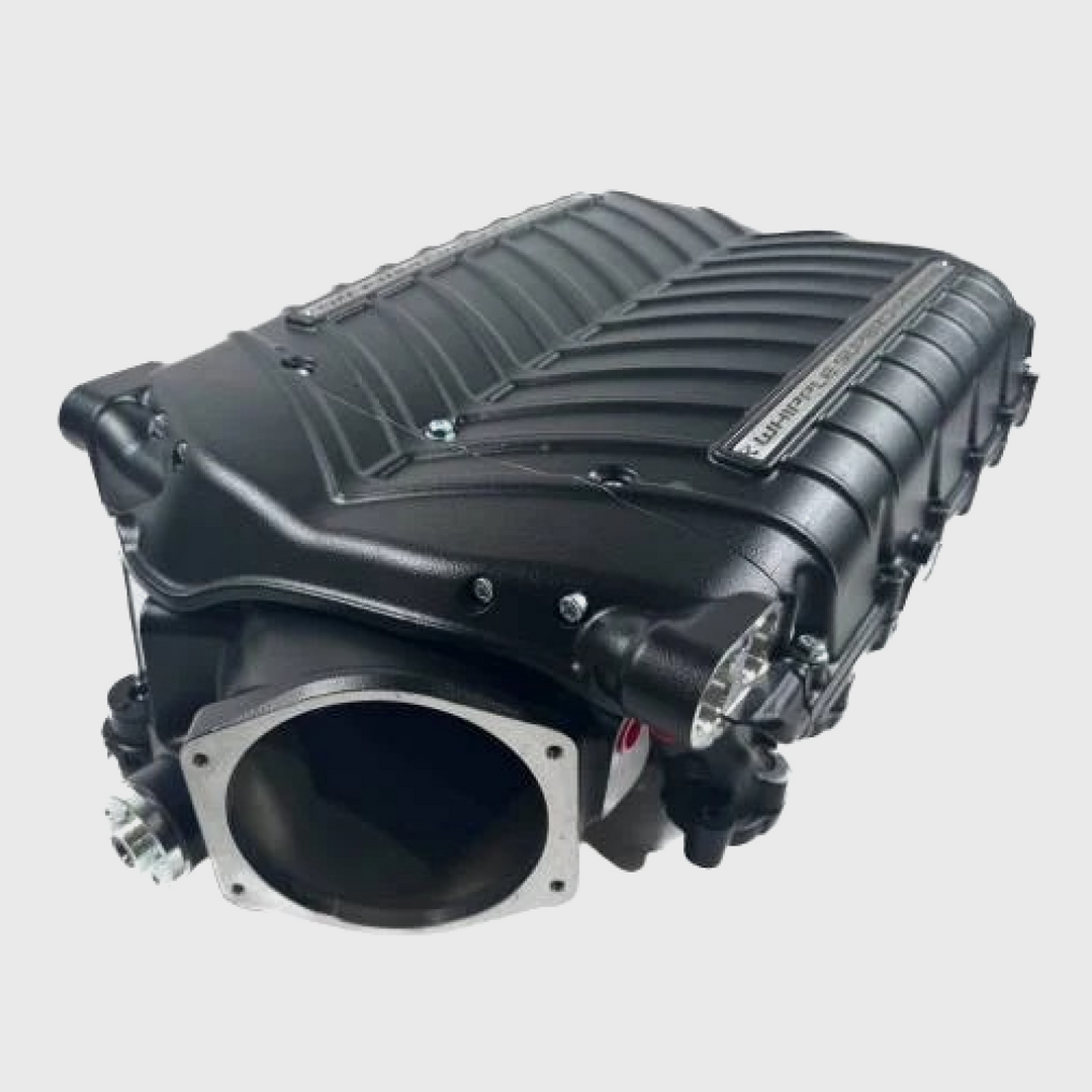 Whipple Superchargers Godzilla 7.3L Ford SC Hot Rod system supercharger installed on a vehicle engine.