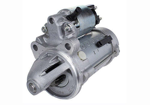 Ford Performance 7.3L gas engine starter showing the starter motor with mounting hardware and electrical connections.
