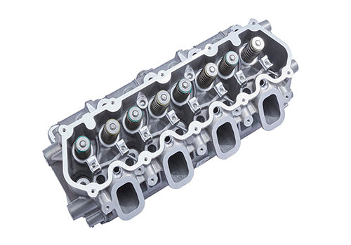 Ford Performance 7.3L Godzilla LH Cylinder Head Assembled showing detailed metal construction and valve components.