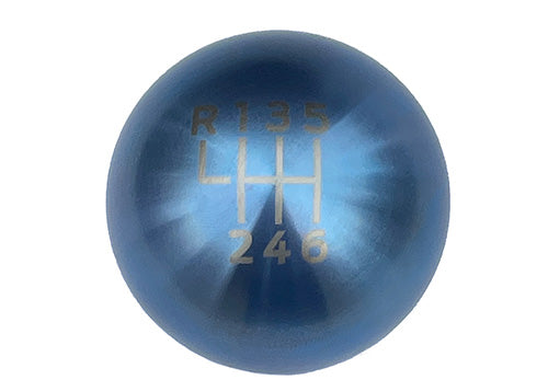 Ford Performance Mustang anodized titanium shift knob M-7213-T with sleek finish and ergonomic design for manual transmission.