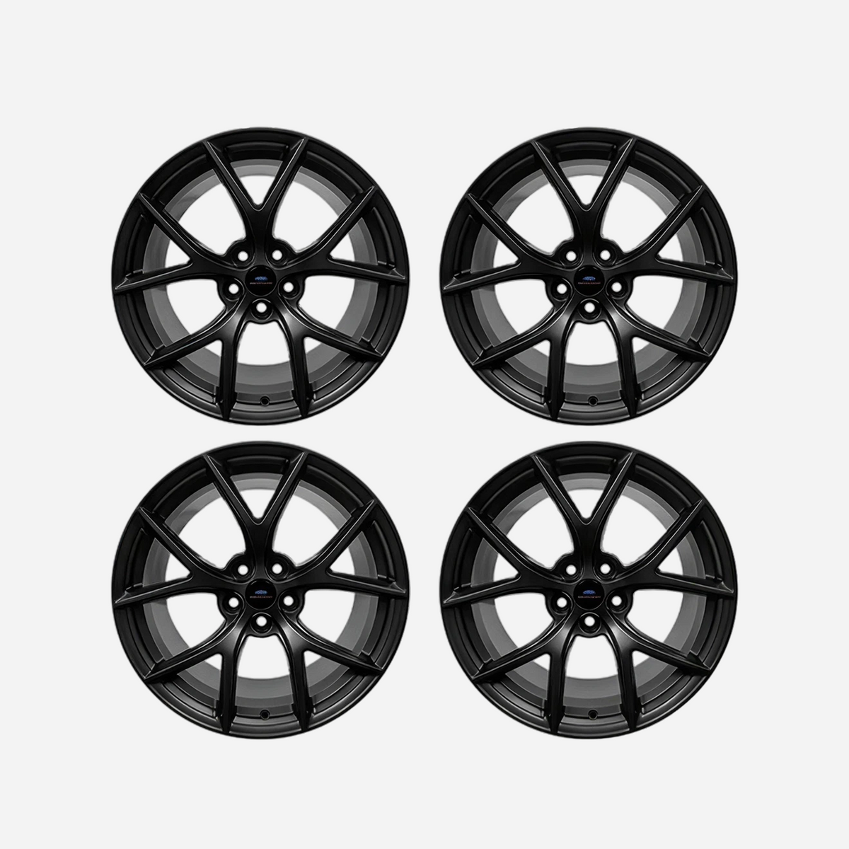 Ford Performance Mustang HP 19-inch matte black wheel kit with 9.5 and 10-inch wheels and TPMS sensors, suitable for performance upgrades.