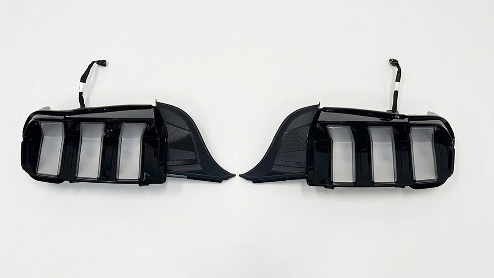 Ford Performance 2024-27 Mustang Stallion white tail lights, sleek LED tail lamps with clear lens and modern design.