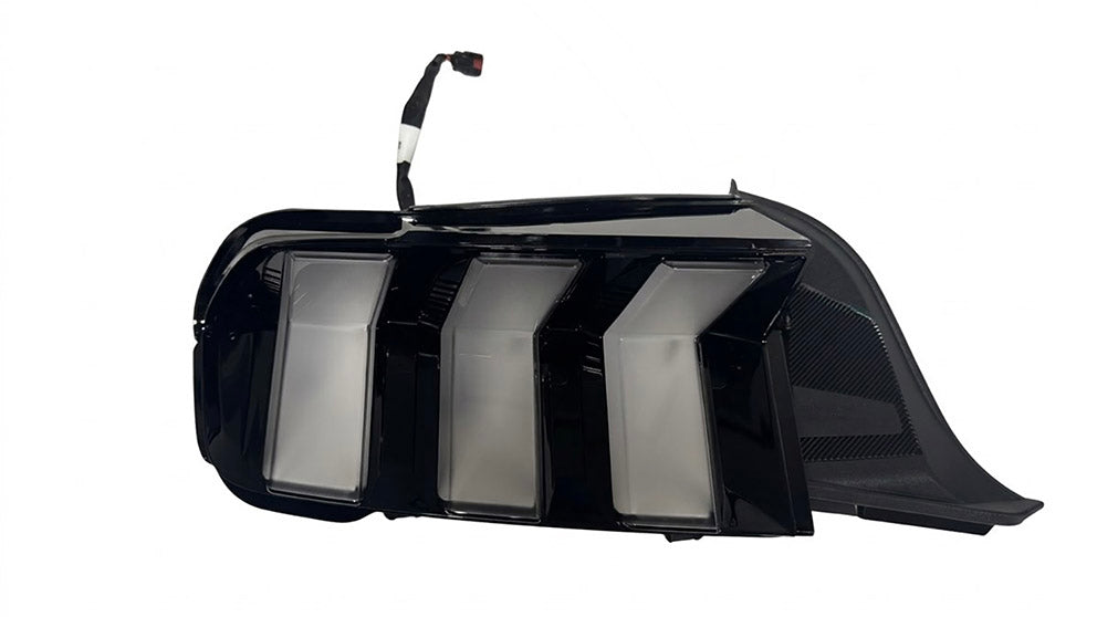 Ford Performance 2024-27 Mustang Stallion white tail lamps showing sleek LED tail light design and bright illumination.