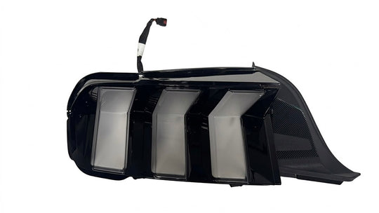 Ford Performance 2024-27 Mustang Stallion white tail lamps showing sleek LED tail light design and bright illumination.