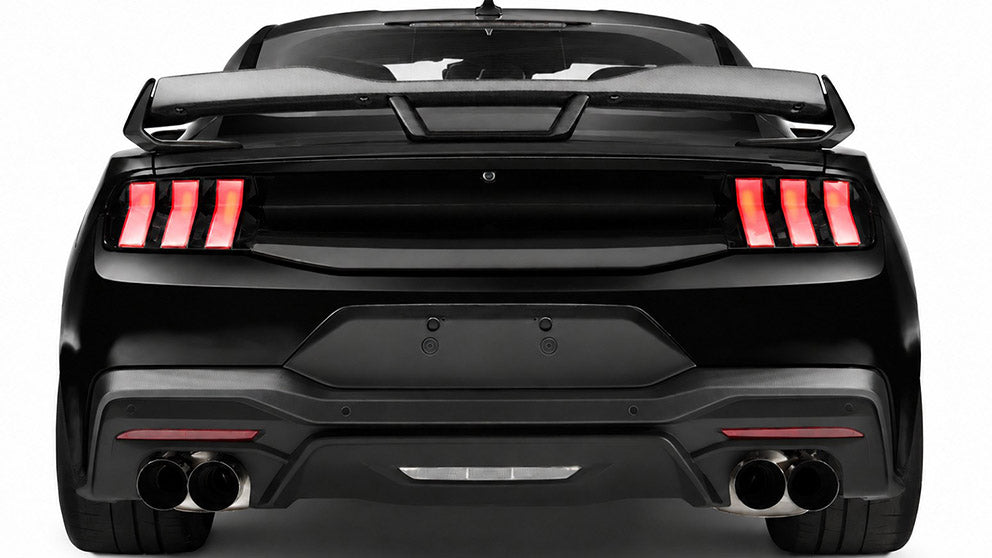 Ford Performance Mustang Stallion 2024-27 white tail lights showing black V-shaped rear design on the vehicle.